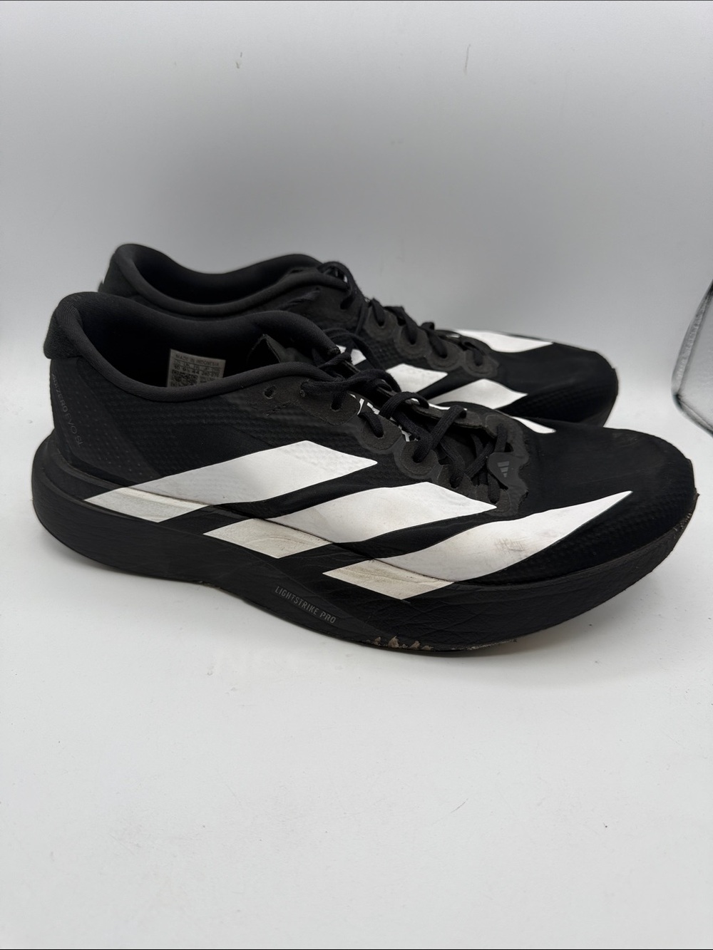 ADIDAS ADEZERO EVO SL MENS 10 Black and White Men's Lightweight Sneakers S16